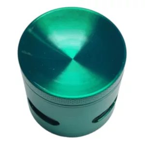 Metal grinder with removable top and base, circular shape, blue and green color scheme, small herb insertion hole, top view.
