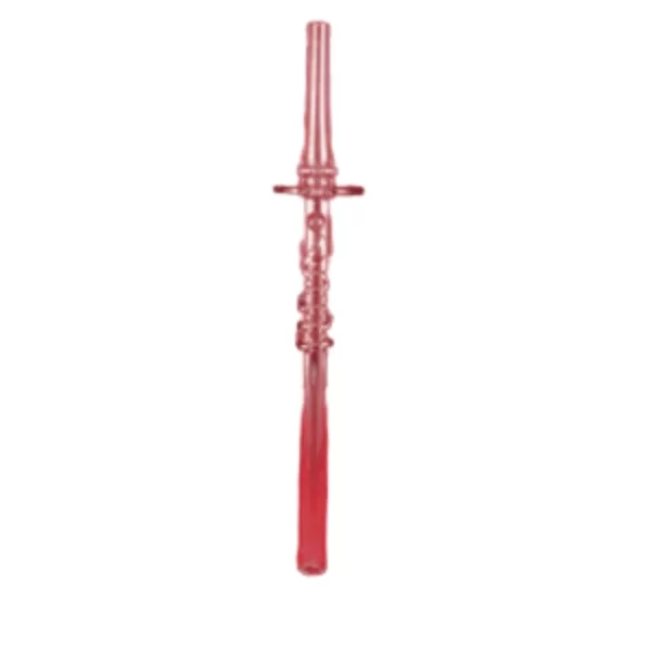Gold-dipped red cylindrical straw with small hole, hanging from triangular stand on wall.