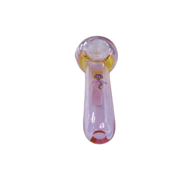 Glass pipe with pink handle and yellow tip, sitting on green background.