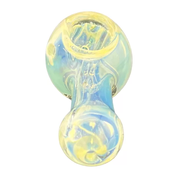Clear glass spoon-shaped vaporizer with yellow and blue swirls, cylindrical in shape with a smooth surface and no visible wear or damage.