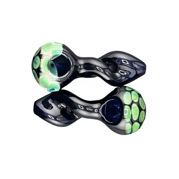 Sleek and modern glass pipes with green and blue swirls, clear glass and smooth curved shape, adorned with small intricate design on the base.