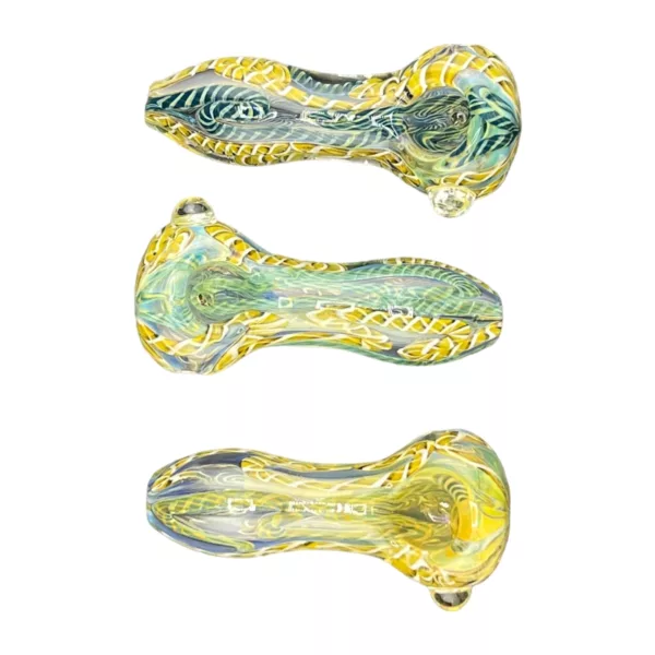 Swirling blue, green, and yellow patterns cover this long, thin micro serpent with a pointed head and curled tail, resembling leaves and vines.