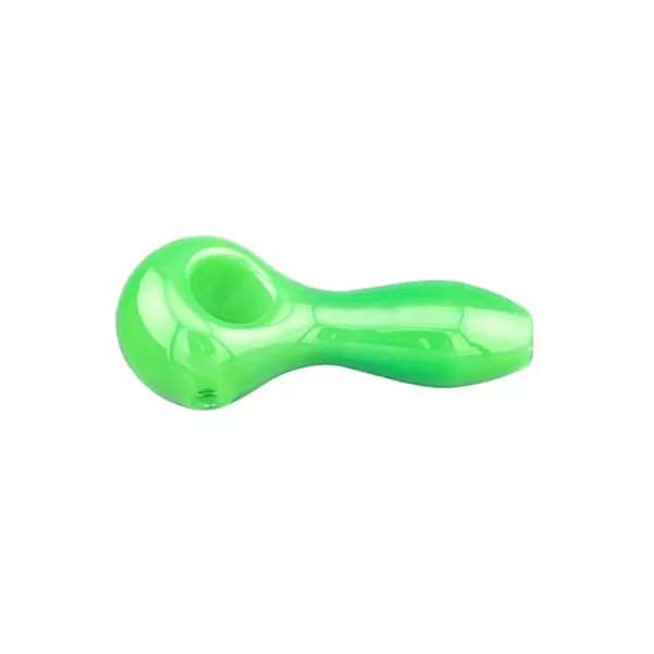Small plastic spoon with green handle, crescent moon shape, straight and curved edges, flat handle, difficult to determine size.