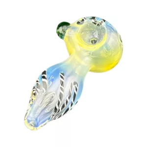 Handmade glass pipe with zebra pattern and clear glass body. Small, curved shape with white background.