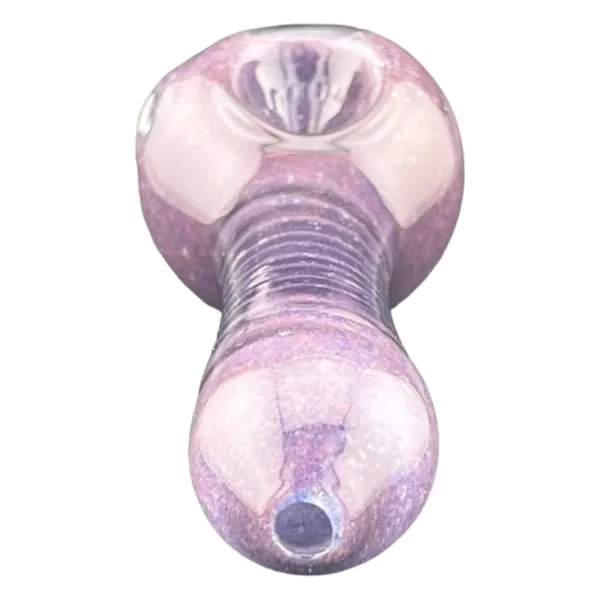 Sparkly purple glass pipe with oceanic spiral design on white surface.
