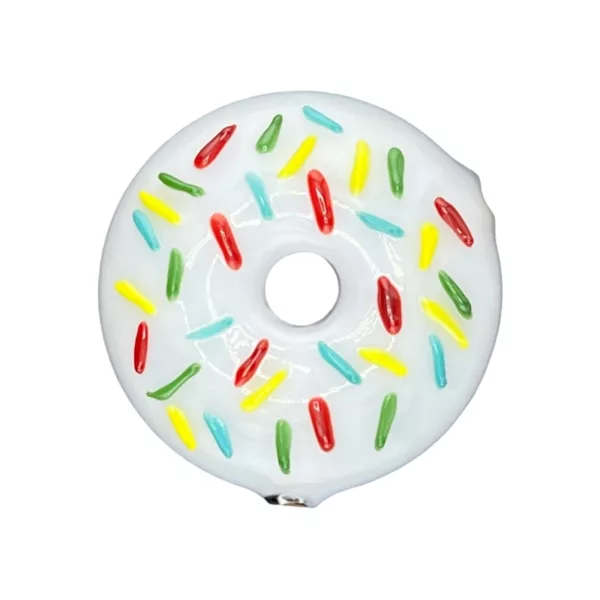 White doughnut-shaped hand pipe with colorful sprinkles on a white background.