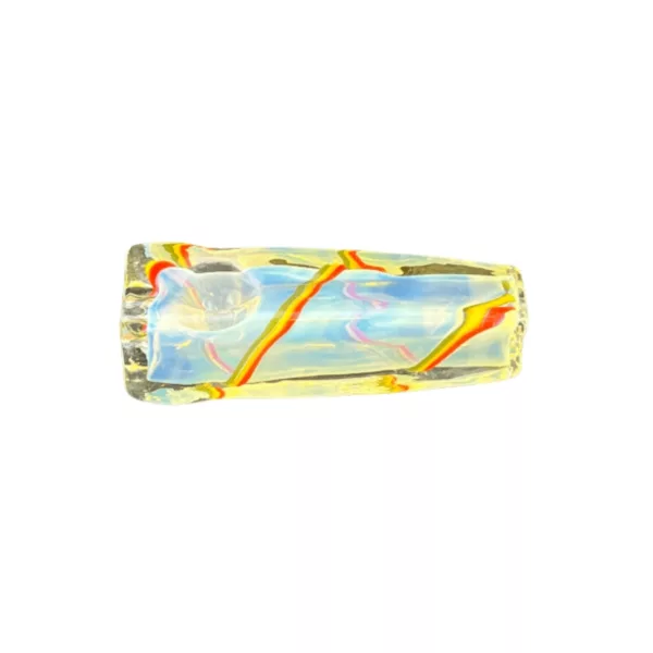 Transparent glass pipe with yellow, red, and orange swirl design and 'Rasta' written in white on front.
