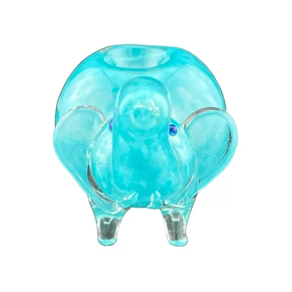 A small glass elephant figurine with a blue body, clear glass trunk, and blue eyes on a white background.