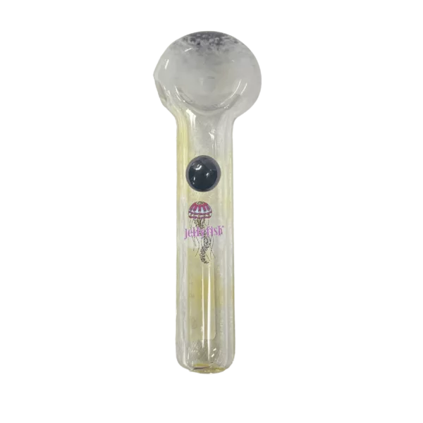 Clear glass pipe with black handle and small black ball on end, sitting on green background.
