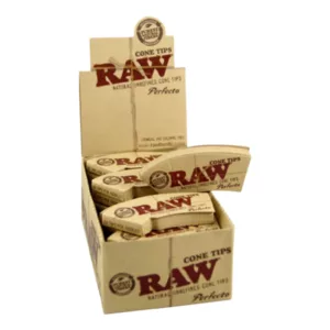 4 rows of 4 Perfecto Cone Tip Unrolled Raw cigarettes in a wooden display box on white background.