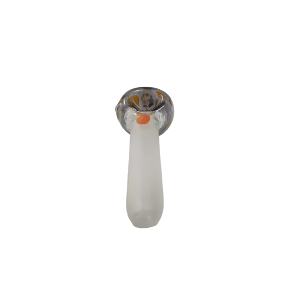 White plastic toilet seat with small hole and orange dot in center, mounted on white pedestal.