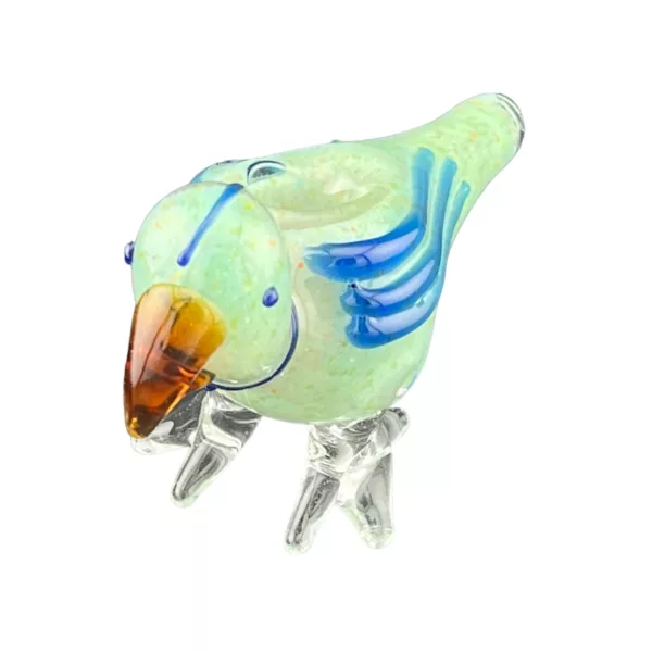 Handcrafted glass parrot hookah pipe with blue-green feathers, yellow beak, and long curved tail. Big round eyes and curved body.