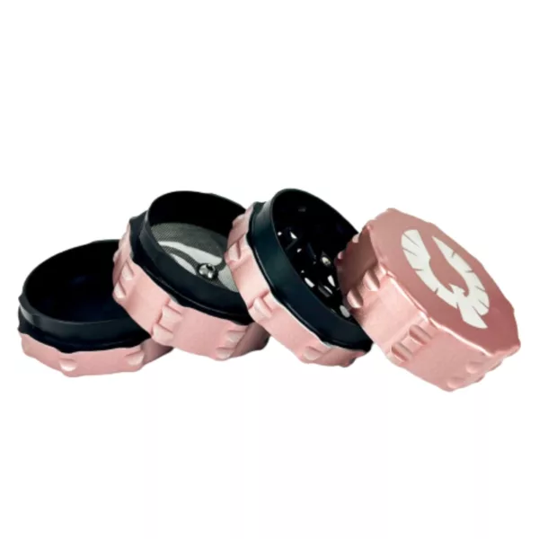Elegant pink and black grinder with clear lid and black base. Perfect for grinding herbs and spices.