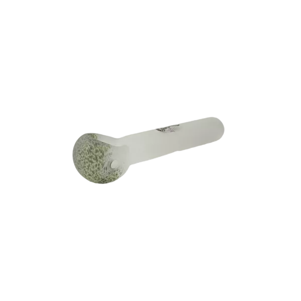 clear glass pipe with a small amount of green plant material inside, set against a green background.