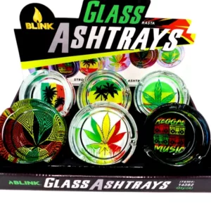 Set of unique glass ashtrays with various designs, including marijuana leaf and skull. Each tray has a green sticker with Glass Ash Trays in white letters.