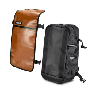 Black and brown backpack with zippered compartment and large pocket. Brown leather strap and black metal buckle.