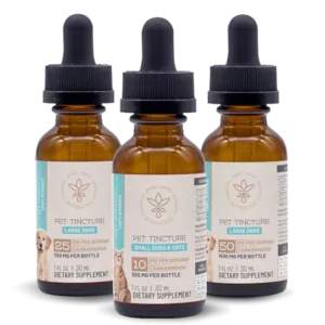 Three Pure CBD Oil bottles in black and white, labeled with dosage and usage instructions for pet tincture.