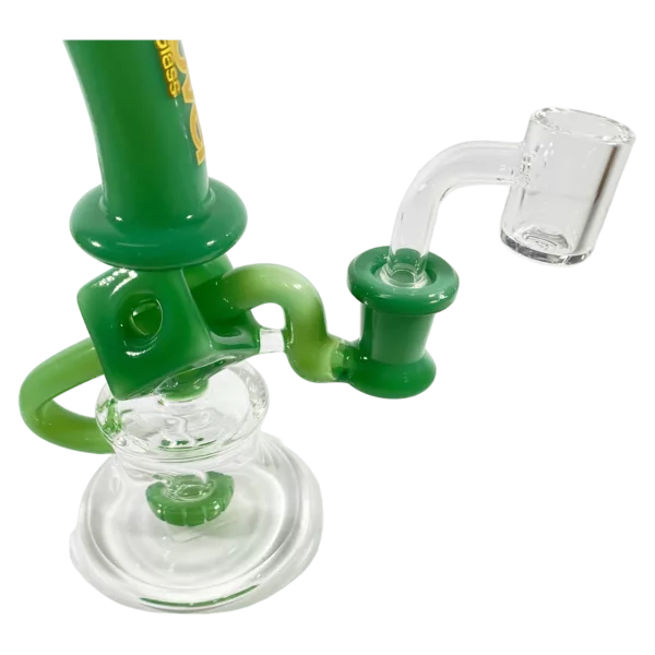 Glass pipe with clear base and stem, featuring a small green glass bowl on both the base and stem.