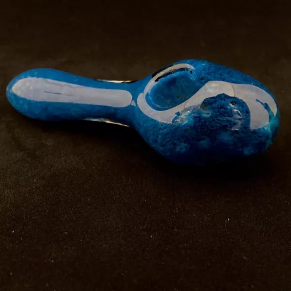Handcrafted blue honeycomb glass head pipe. Unique and eye-catching design. Perfect for smoking enthusiasts.