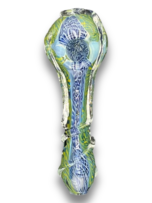 Opaque glass flower in green and blue, arranged in a spiral pattern, floating in mid-air.