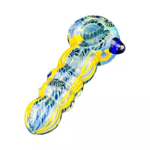 Handcrafted clear glass marijuana pipe with blue and yellow etched patterns, metallic blue bowl and stem, and silver mouthpiece with swirling designs.
