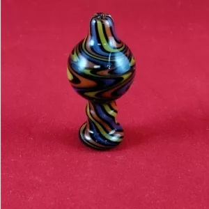 stylish glass bead with a multicolored swirl design. Perfect for use with carb caps on bongs and water pipes.