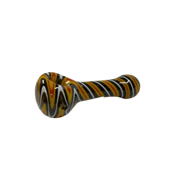 Glass pipe with swirled design in yellow, black, and white. Curved shape and small smoking hole. Intricate and detailed design. Green background.