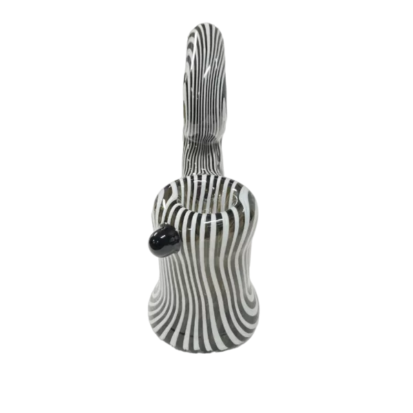 Clear glass vase with black and white stripes, round base and narrow neck, on green surface. McD's Zebra Bubbler - CCWPF182 for sale on smoking company website.
