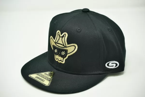 Black fitted cap with gold skull emblem on front, adjustable strap at back. 59FIFTY New Era Fitted Cap.