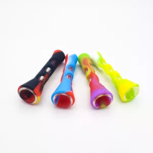 Three colored glass pipes in a line, arranged in a curved shape with red, blue, and green colors.
