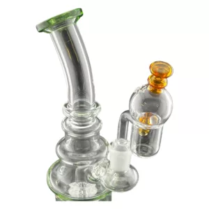 Glass water pipe with terp bead on top, clear stem, and bowl-shaped base. Small amount of water inside. No other objects or people in image.