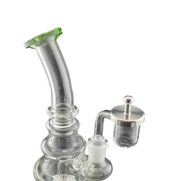 Green-stemmed smoke tube carb cap with clear cylinder and small indentation. Attaches to metal piece with hole.
