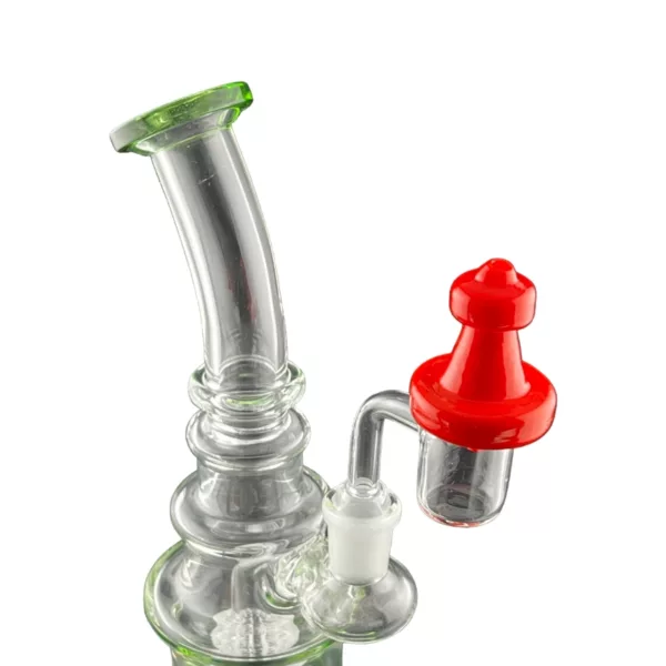 This NN824 Chess Pawn Carb Cap fits a glass bong with a red handle and clear base, featuring a small and large hole.