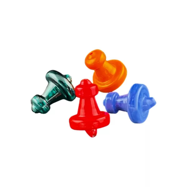 Four plastic chess pawn carb caps in red, green, blue, and orange, arranged in a symmetrical pattern with raised letters and numbers. Middle cap has white arrow pointing downwards.