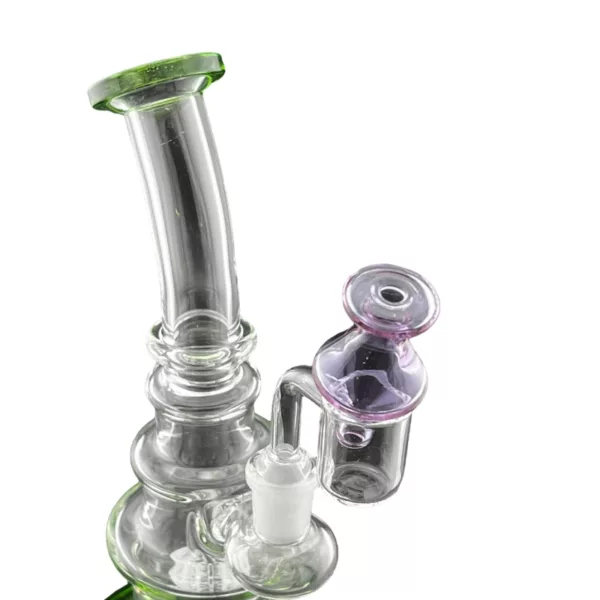 NN1833 Spin Top Carb Cap for smoking pipes, clear with purple ring around base.