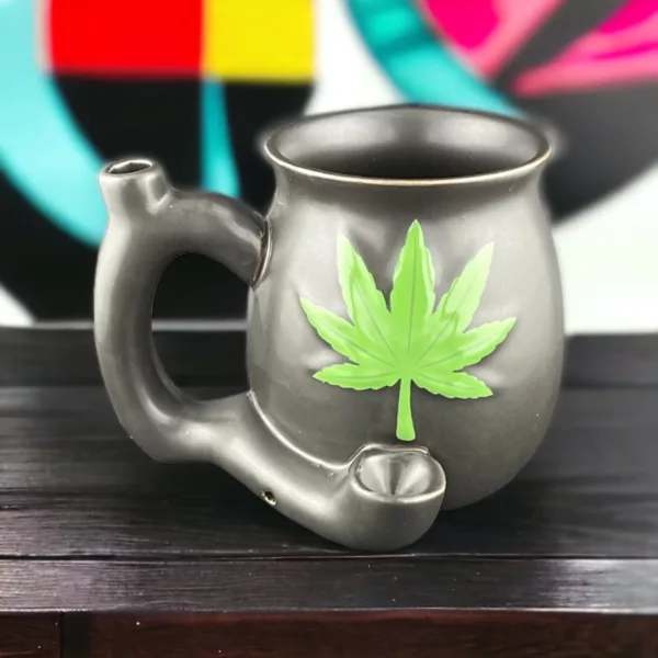 Matte Black Mug with Green Leaf Design - Perfect for Coffee and Tea.