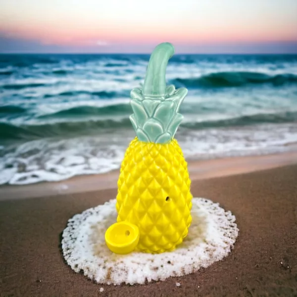 Relax on the beach with our Pineapple Novelty Pipe - Roast And Toast. Enjoy the warm glow of the sunset while smoking.