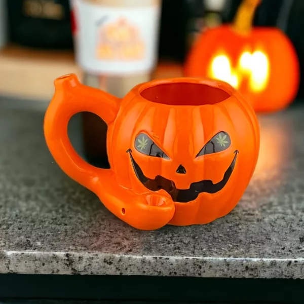 Handcrafted pumpkin mug with black handle and side handle, perfect for sipping your favorite hot beverage.