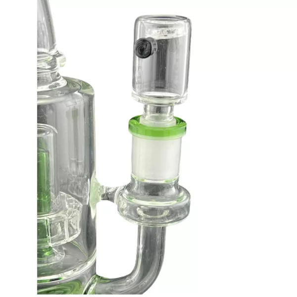Stainless steel bong with clear glass bowl and screen. Small stem and circular design. Vent hole on base. Bright white lighting. NN146914M.
