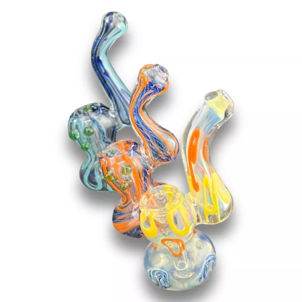 Three glass bongs with different color swirl designs. Clear glass, curved base, and tapered neck. Sitting on white background.