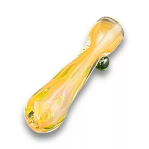 Polka dot glass waterpipe with yellow, pink, and green bowl. Small smoking hole at end.