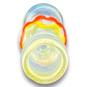 Glass pipe with yellow, red, and blue swirl pattern. Sits on white background. From Rasta Chillum - VSXY98.