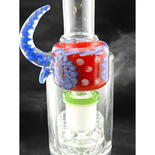 A glass bong with a red, white, and blue design, featuring a long curved shape, small round base, and a mouthpiece shaped like a snake's head. It sits on a black background.