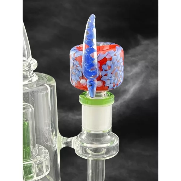 Red, white, and blue striped glass bong with small base and large mouthpiece. NN1791.