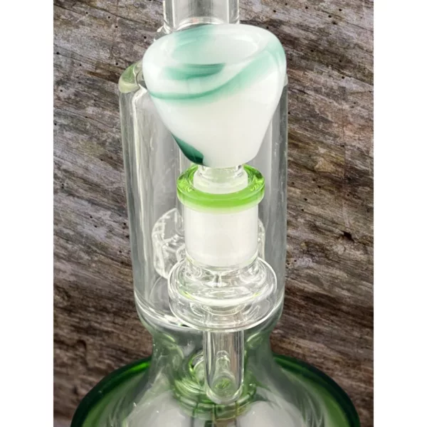 Stylish, frosted glass bong with green and white swirl design. Perfect for smoking enthusiasts.