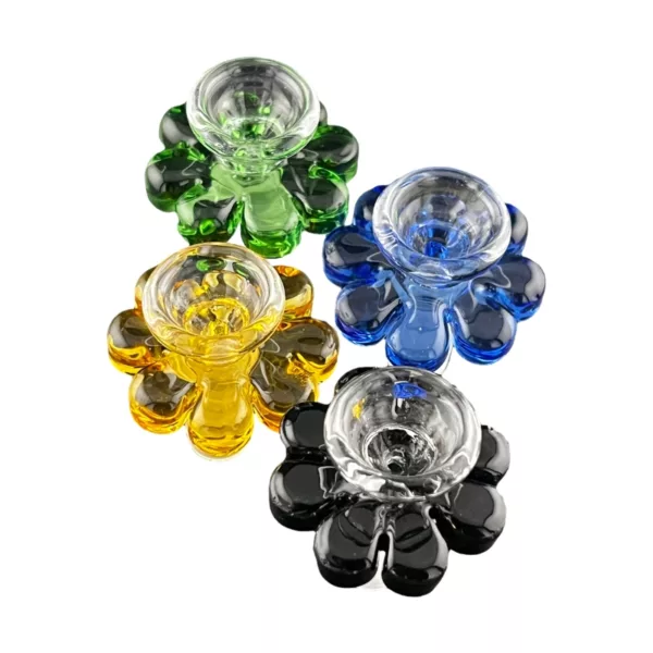 Glass flower bowl with 4 colored petals (blue, green, orange, yellow) on white background. Round, 12cm diameter, connected to a stem.