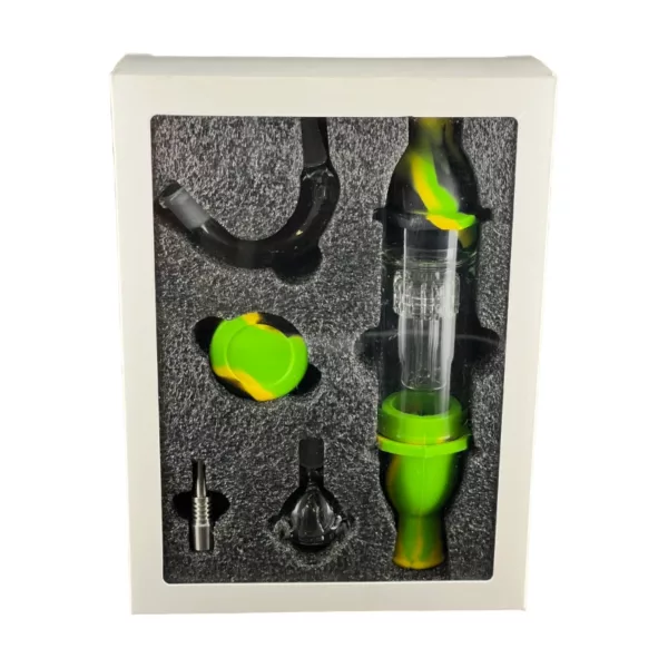 Vaporizer kit includes silicone nectar collector with torpedo perc and two glass cups. Silver/black base, green/black tip, with ring for attachment.