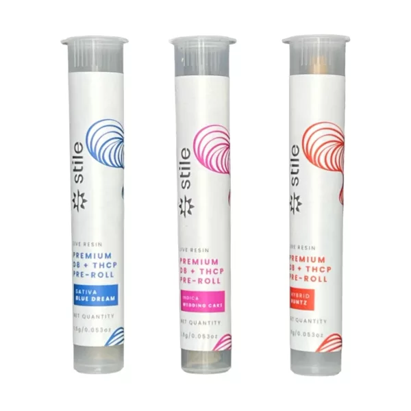 Three tubes of lipstick in red, pink, and purple, with a creamy texture and shiny finish. Labeled 'Shine' in white on a transparent tube.