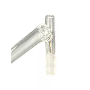 A clear glass pipe with a metal clamp and small hole at the end.