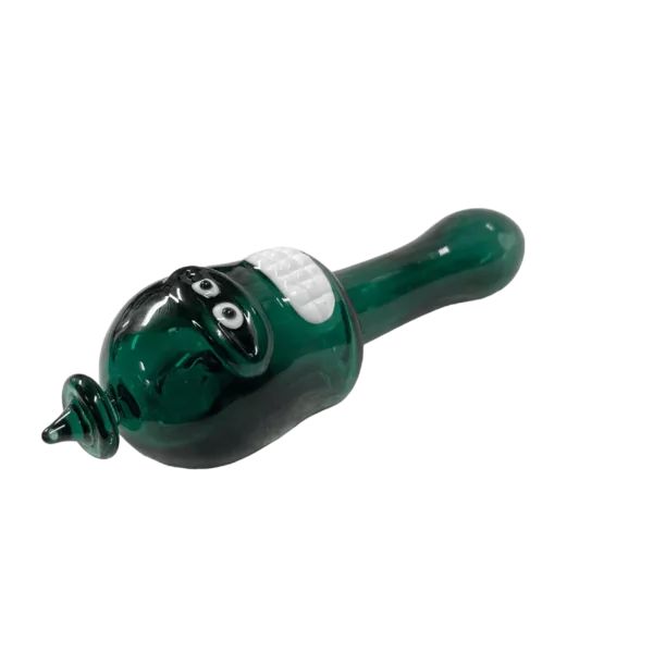 Whimsical green glass pipe with black, smiling head and wide base. Clear stem and bowl with concentric circles. Perfect for a playful smoke session.